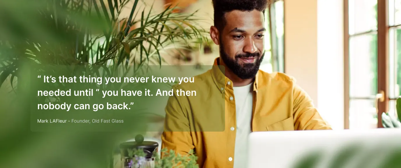 247Invoicing merchant working at a laptop